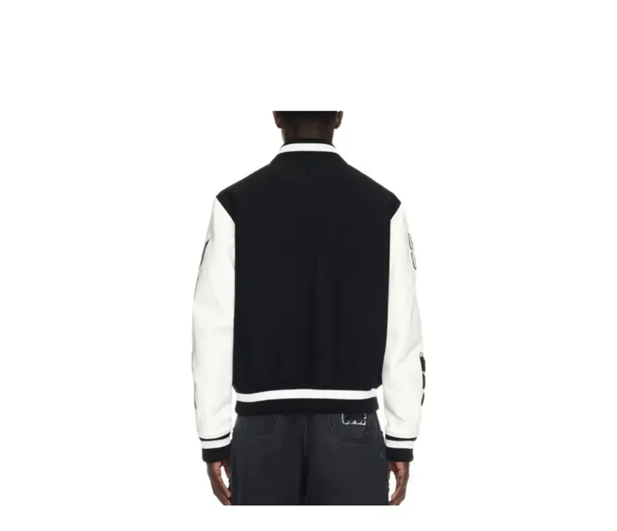 ♻️💯Reference model picture for the upper body❤️Top tested version off white Heavy embroidery patchwork leather high temperature hot crystal diamond baseball uniform male and female couple star same style (⚠ Original button molding and customization, patch embroidery and color matching) Original packaging and original label🔍 Full set of accessories customized, packaging elevators are purchased from the original factory, all hardware parts are molded and customized, and the fabric color components are restored one to one The fabric is made of 65% wool, 15% natural silk, 10% spandex and 10% velvet, mixed and custom-woven. The total weight is more than 900 grams! And the most important thing is its color fastness, it will never fade! -The embroidery uses an imported towel embroidery machine. Each pattern is first embroidered on the fabric, and then engraved with an infrared laser, and then fixed with a sewing machine. The whole garment is labeled in many places, one is flat embroidered, and the large pattern on the back is directly embroidered on it. This dress has 4 different embroidery techniques⚠ -The sleeves are all made of two-layer pebbled fabric, which is processed, shaped, colored, washed, and the texture retains the original grain structure! Thick, plump and round! -The processing technology is extremely complex, the cutting pieces are neatly aligned, and the entire garment has precise wiring density. Gender-neutral style. Loose fit, self-conscious quality control, details determine success or failure. Color: Black Size: S M L XL P: 680